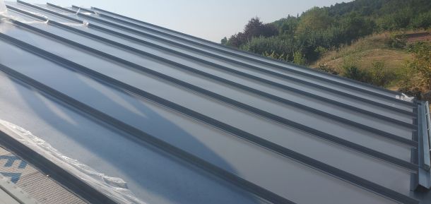 Toiture avec zinguerie en Zinc VMZINC