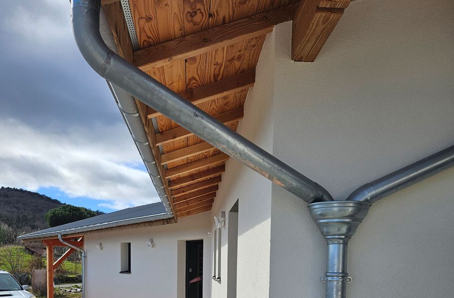 Création d'une descente des eaux pluviales pour une maison ossature bois