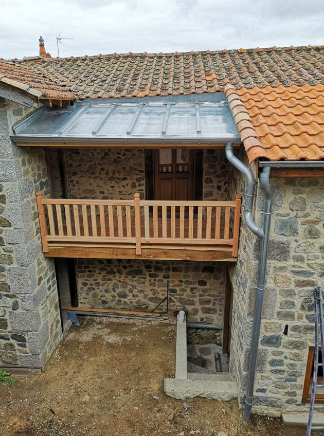 Couverture en zinc et rambarde et plancher en chêne