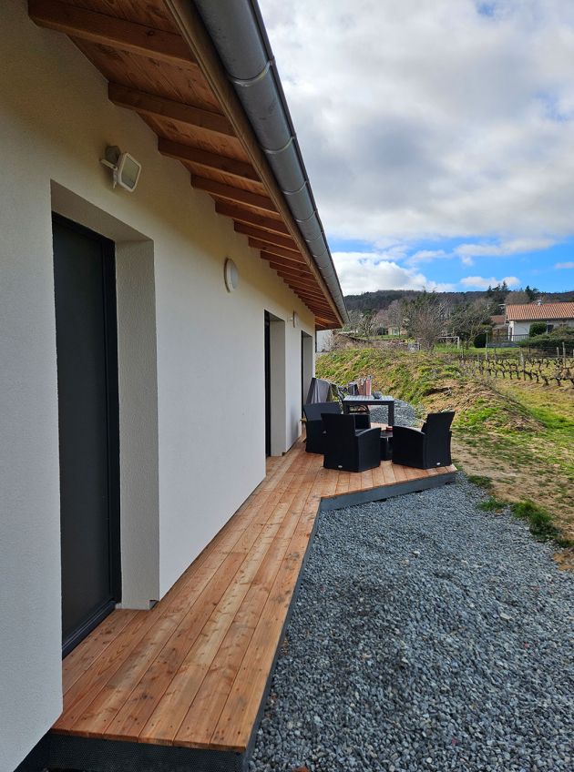 Crépis sur fibre de bois d'une maison ossature bois